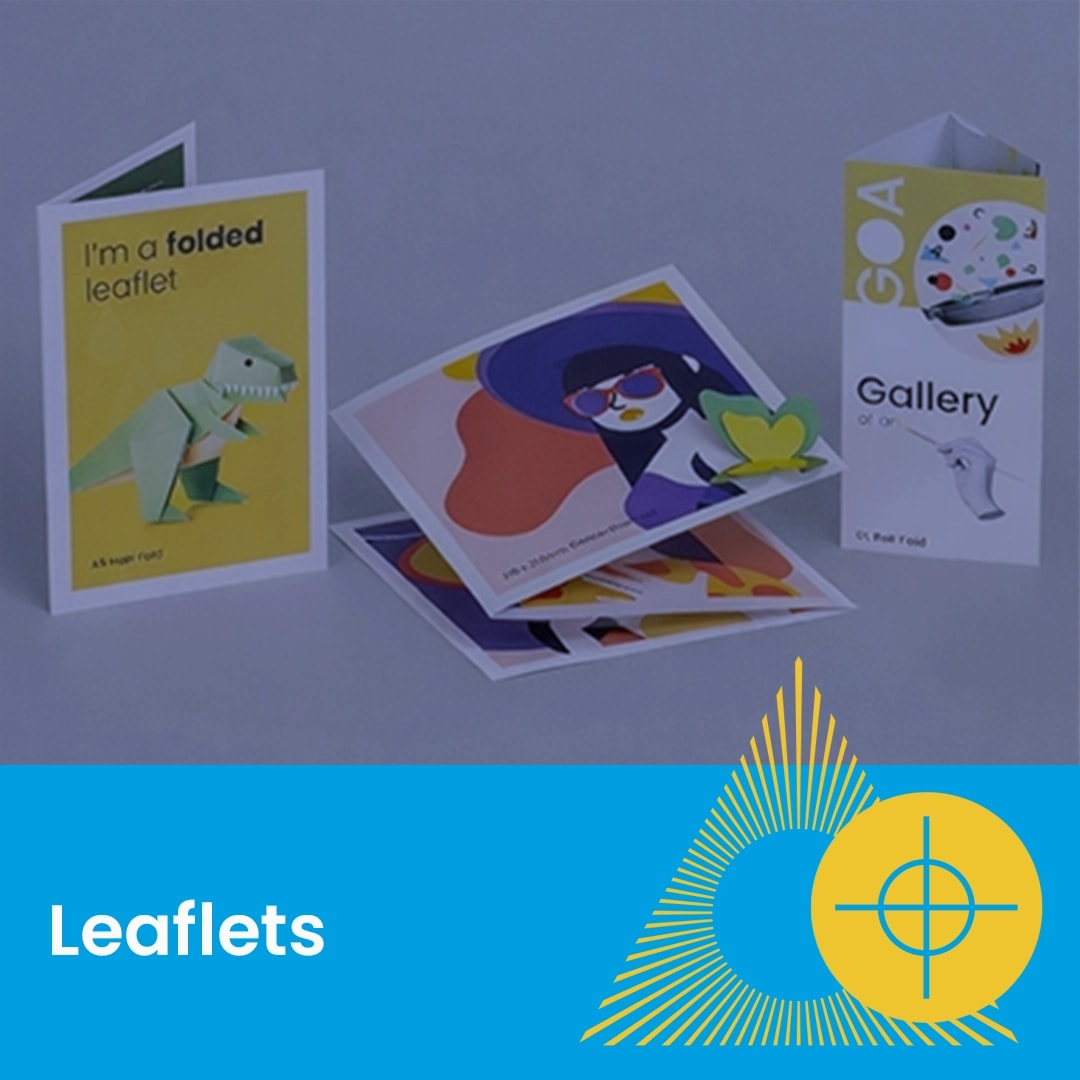 Three colorful, folded leaflets standing on a surface with "Leaflets" text below.