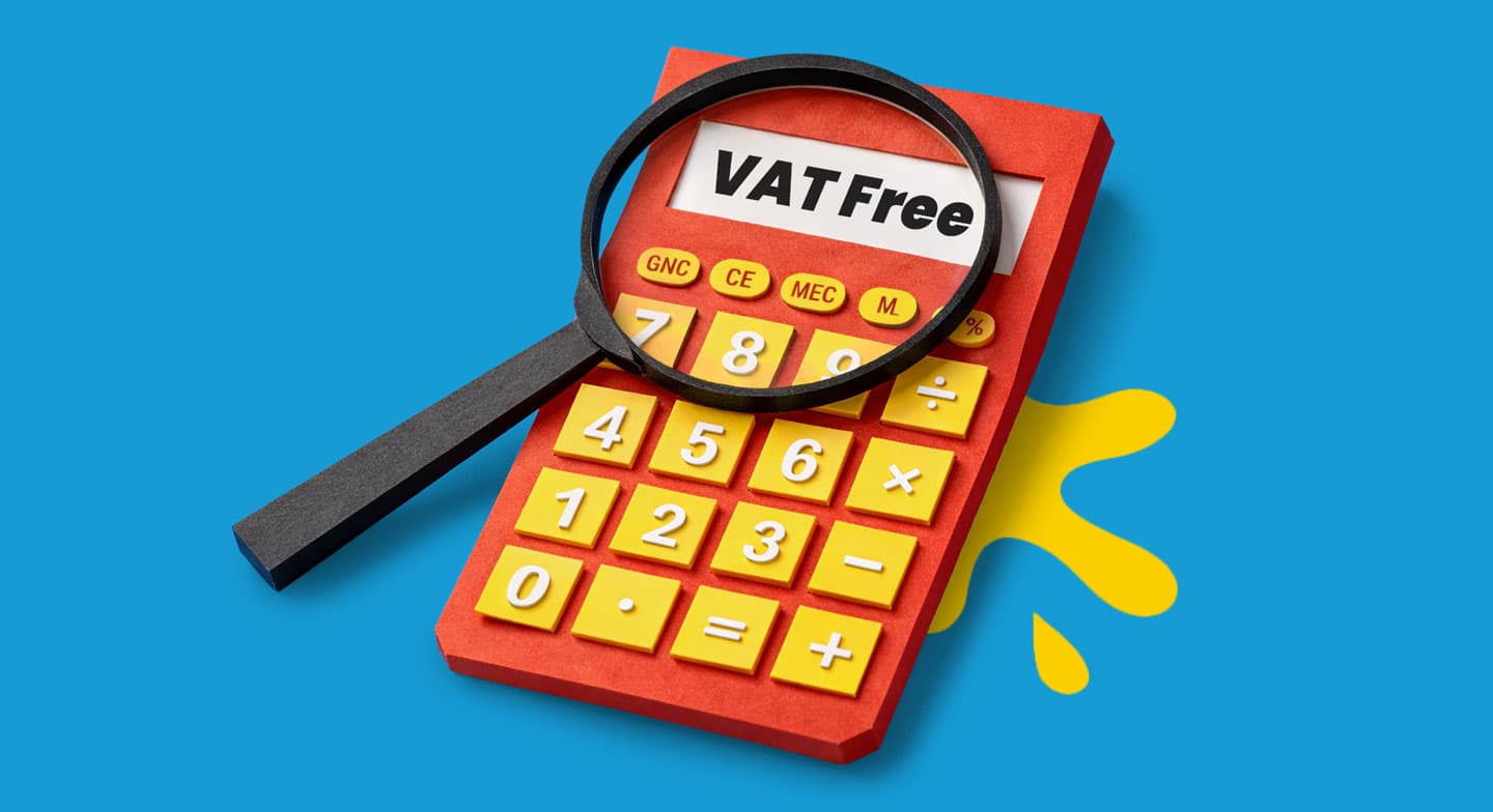 Red calculator with a magnifying glass highlighting the words "VAT Free" on a blue background.