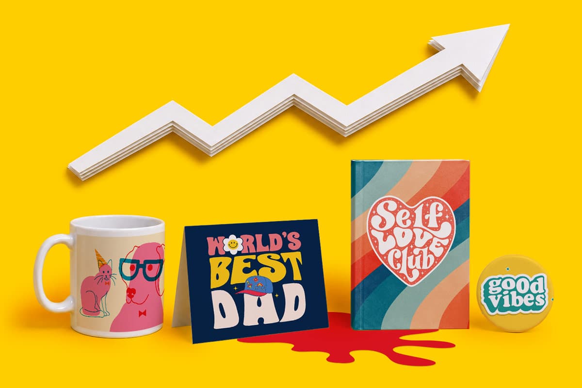 Mug, cards, notebook, and button arranged under a white upward arrow on yellow background.