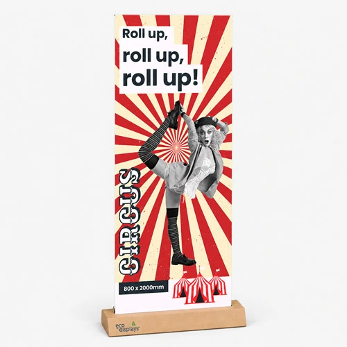 Circus-themed banner with performer, red rays, and text: "Roll up, roll up, roll up!.