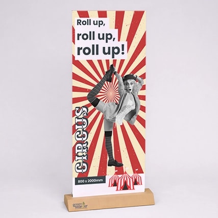 Circus-themed banner with performer, red rays, and text: "Roll up, roll up, roll up!.