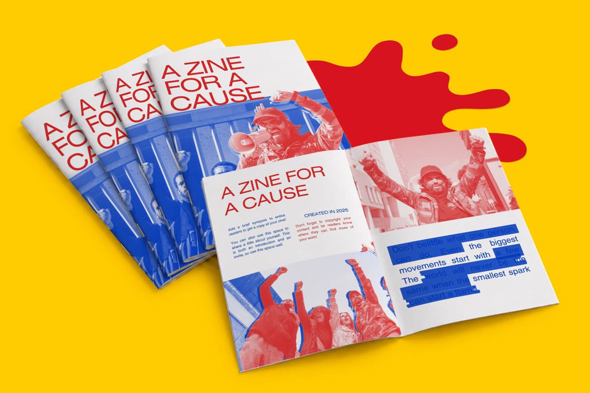 Five copies of a zine titled “A Zine for a Cause” are displayed on a yellow surface.