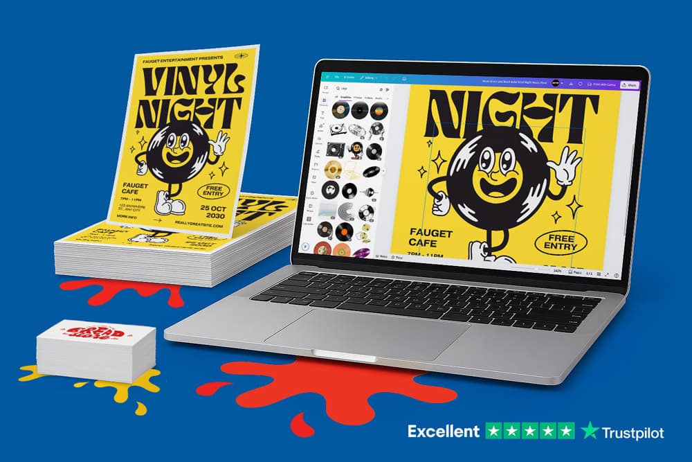 A laptop displays a music festival poster design on Canva; printed posters are stacked behind.