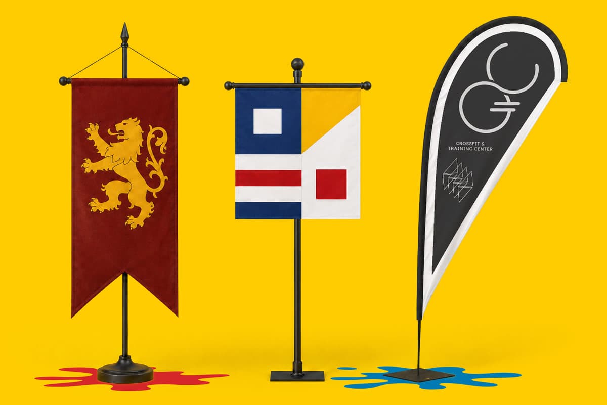 Three different vertical flags on stands against a yellow background with coloured paint splatters.