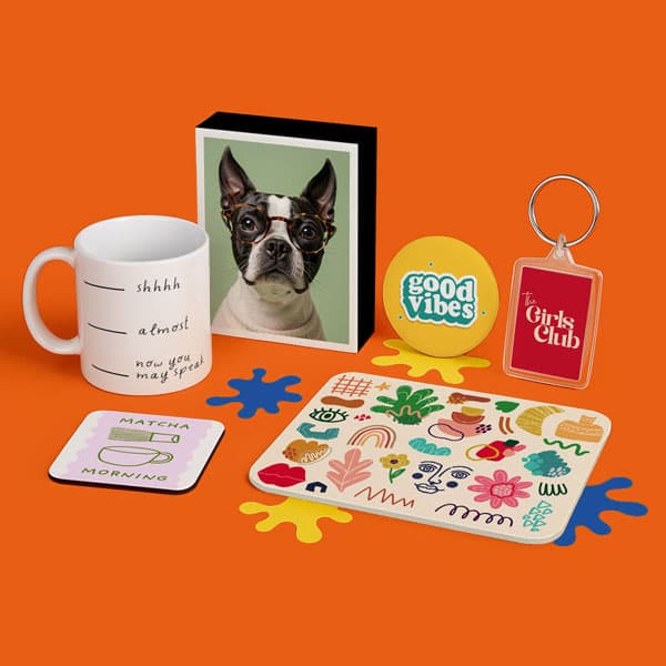 A mug, dog photo, keychain, coaster, sign, and colorful items on an orange background.