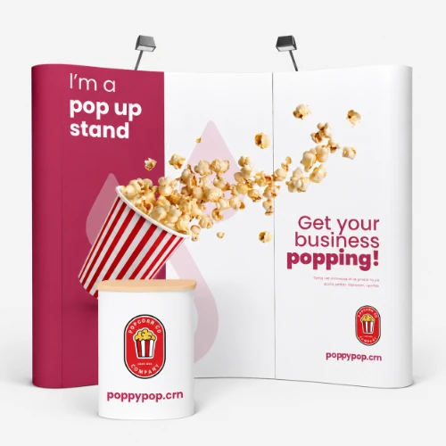 Red and white pop up stand with popcorn tub with popcorn spilling out at a business pop-up stand display.