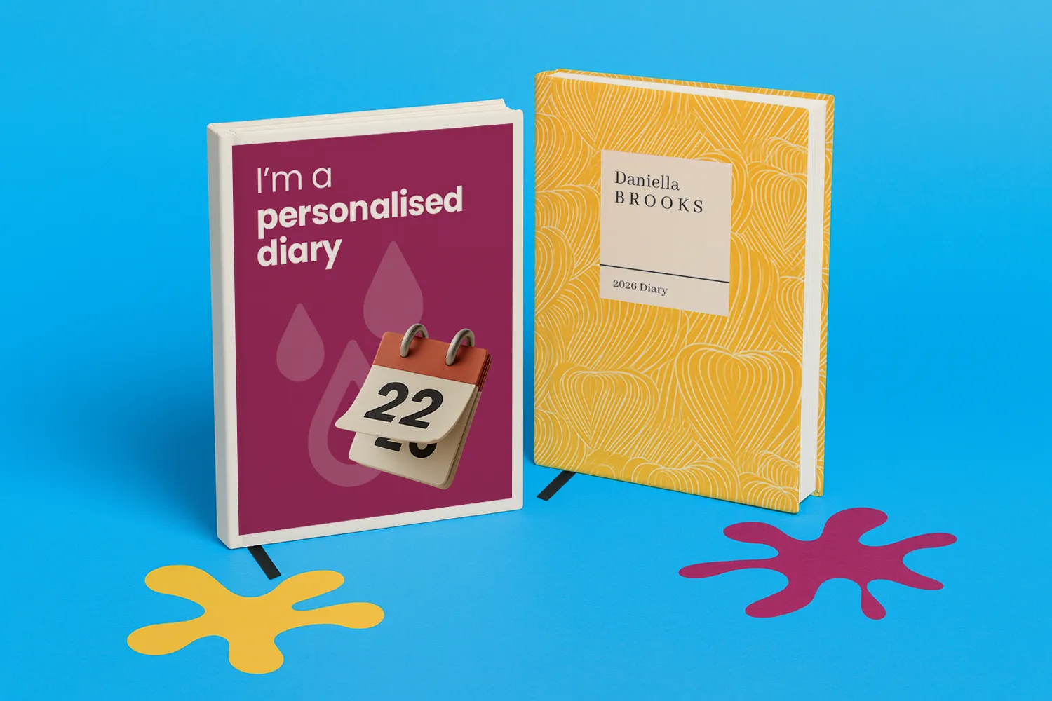 Two personalised diaries are displayed upright against a blue background with yellow and pink shapes.