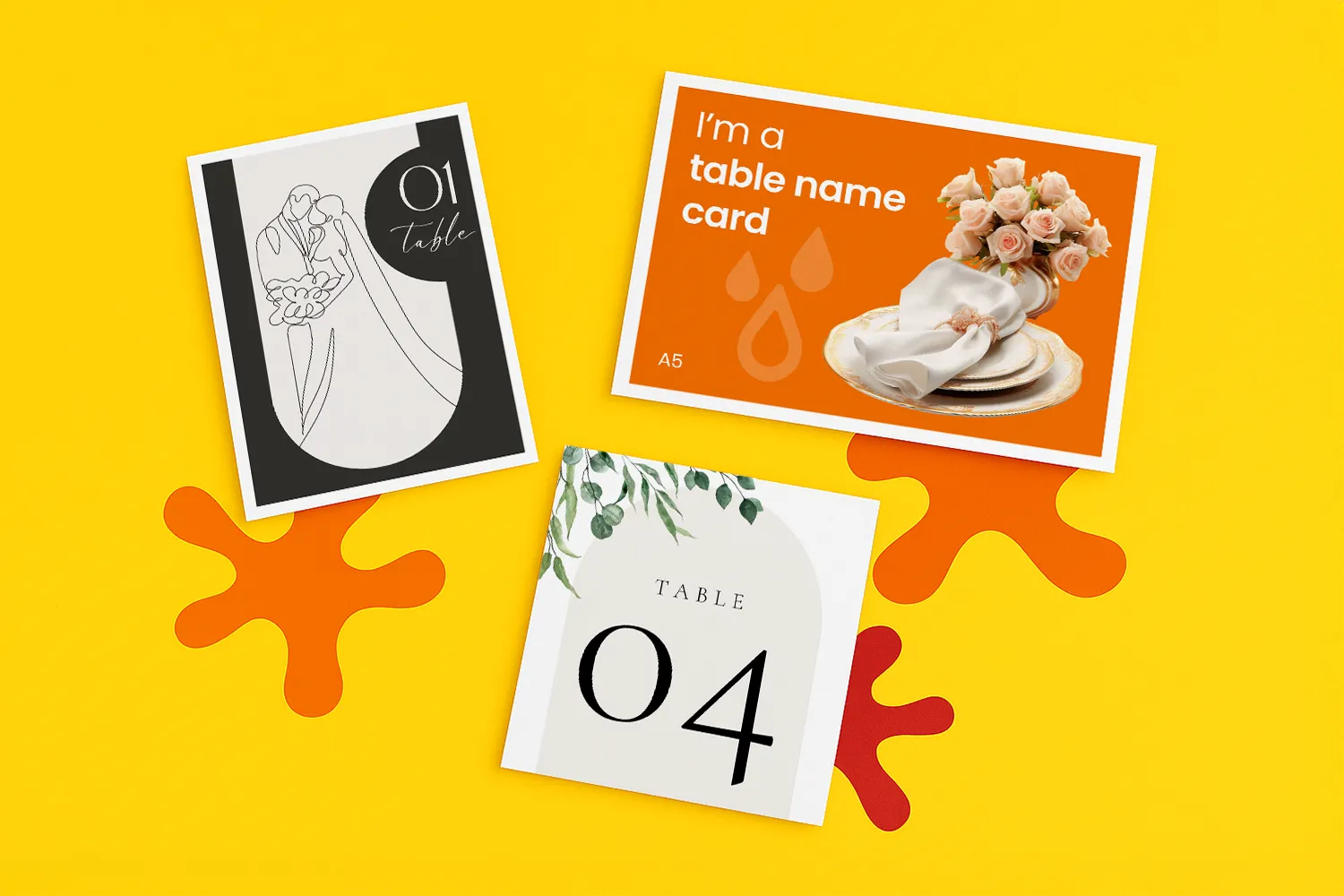 Three differently designed table name cards on a yellow background with orange decorative shapes.