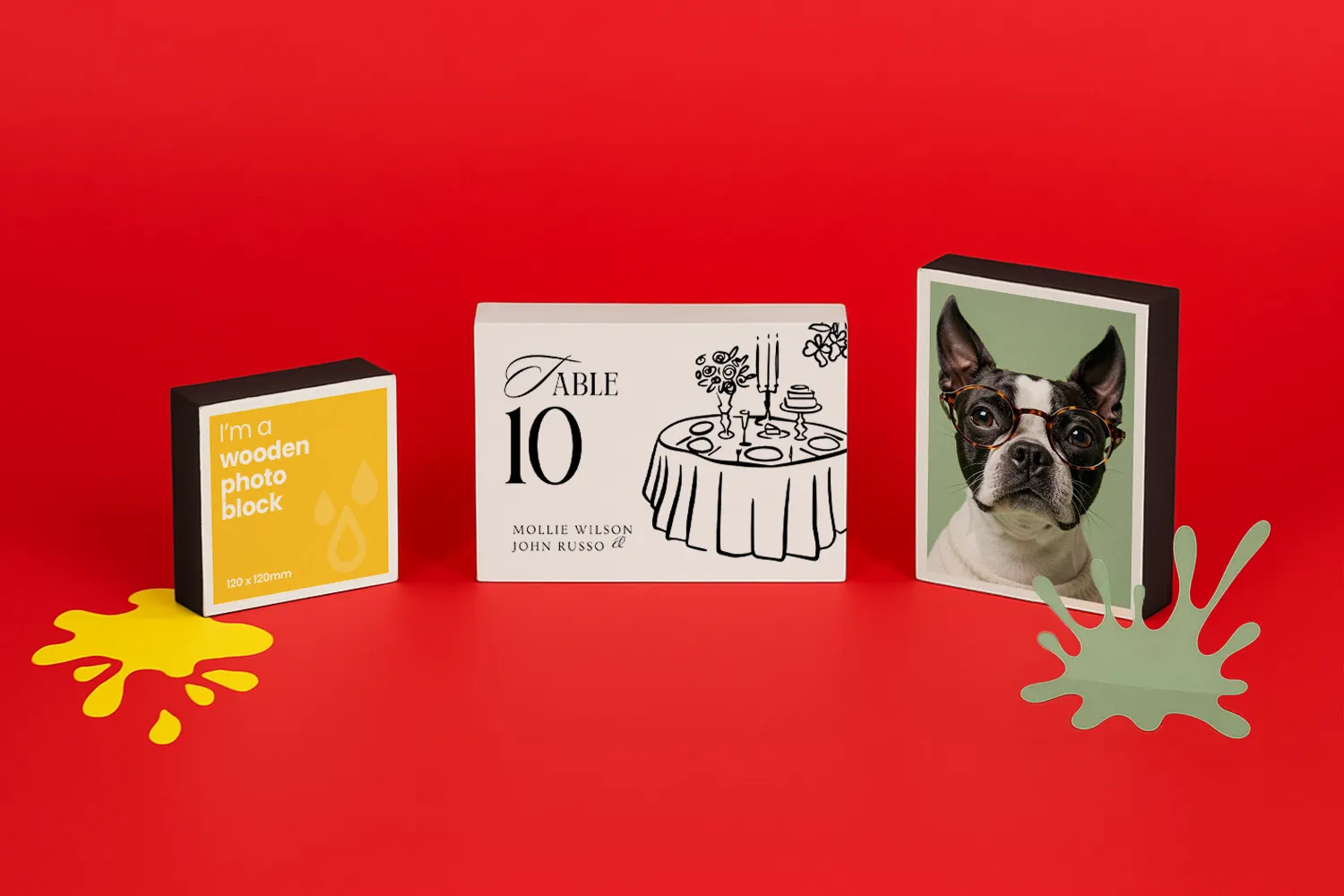Three wooden photo blocks on a red background, one with text, one with a table card, one with a dog.