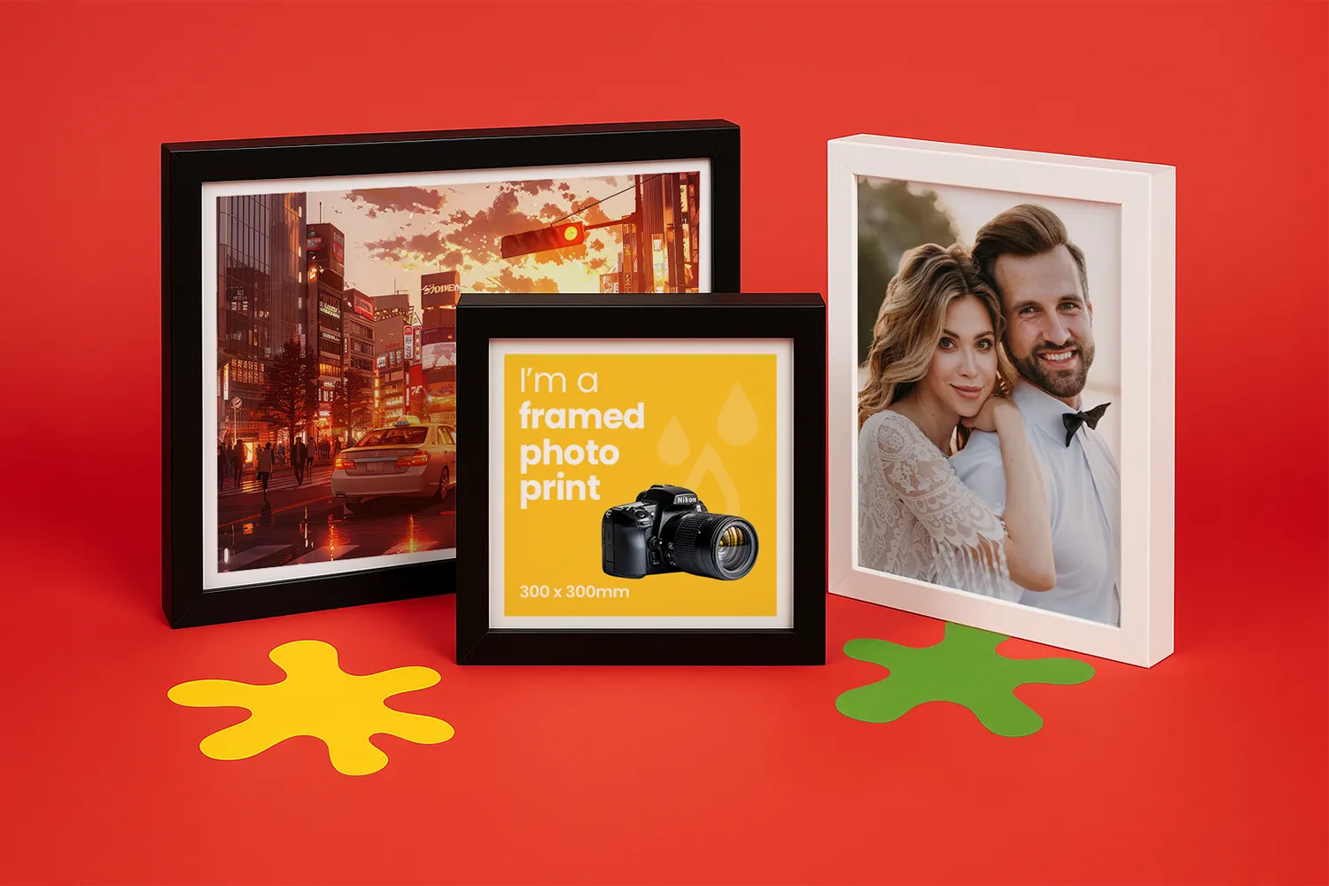 Three framed photo prints displayed on a red surface with yellow and green paper shapes.