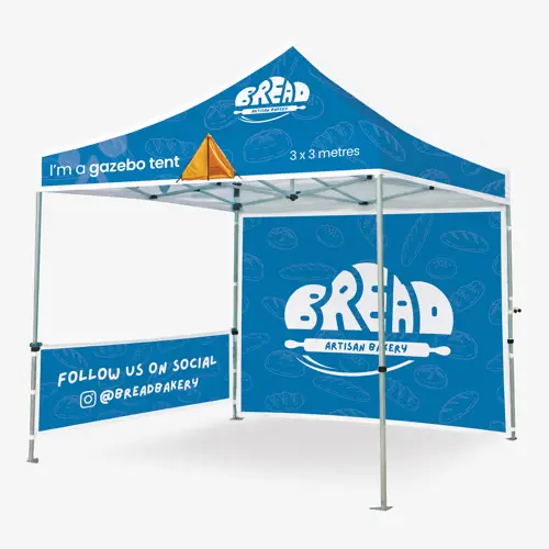 Blue and white Bread Bakery gazebo tent with logos and social media handles displayed.