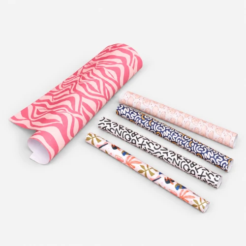 One large sheet and four rolls of patterned gift wrap.