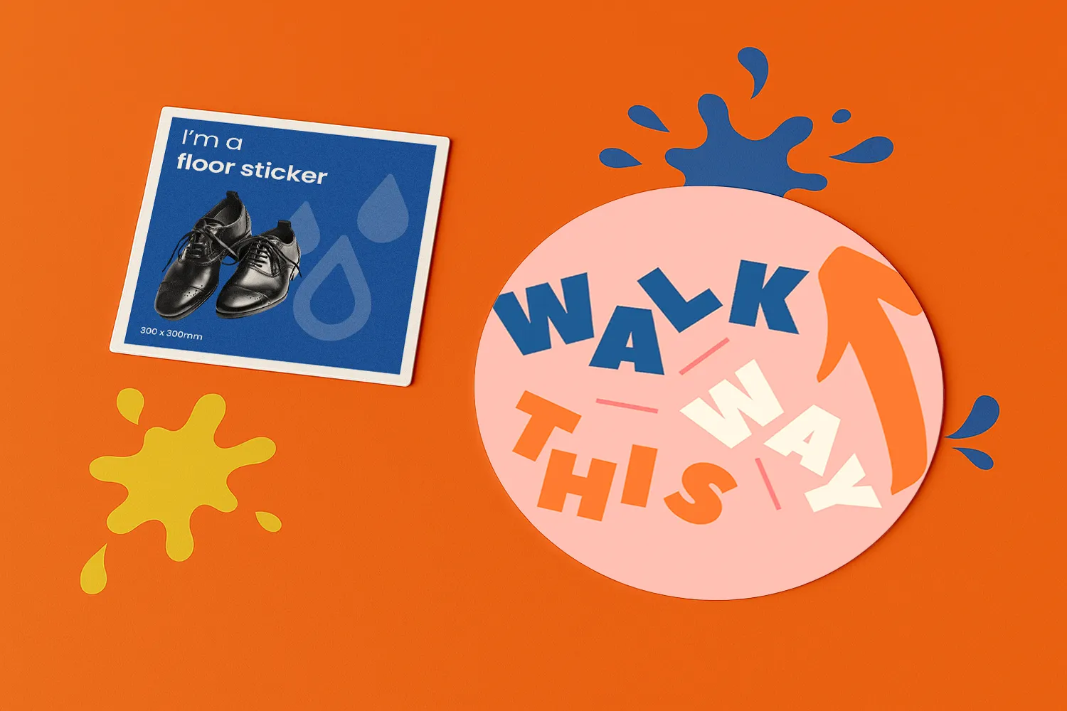A floor sticker with “WALK THIS WAY” on a pink circle, next to a blue floor sticker.