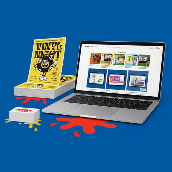 A laptop, Vinyls Night flyers, and a card deck on a blue background with red paint splatters.