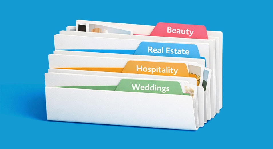 Four labeled file folders: Beauty, Real Estate, Hospitality, and Weddings, on a blue background.