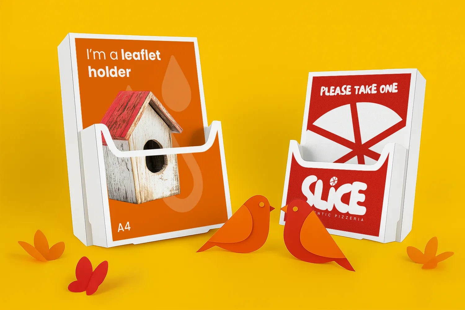 Two leaflet holders with promotional cards, paper birds, and butterflies on a yellow background.