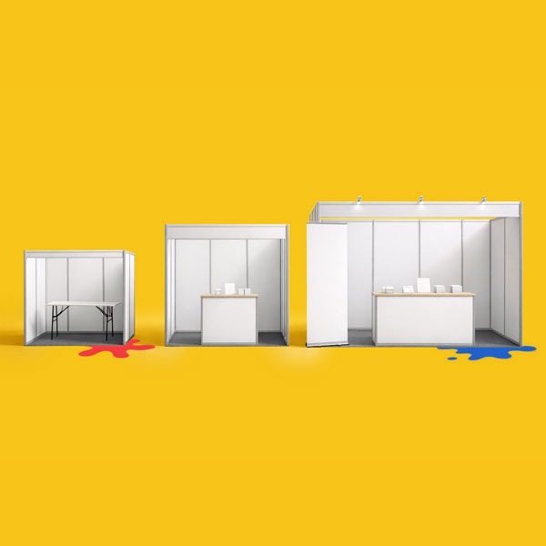 Three different sized white booths on a yellow background with colored paint splatters below.