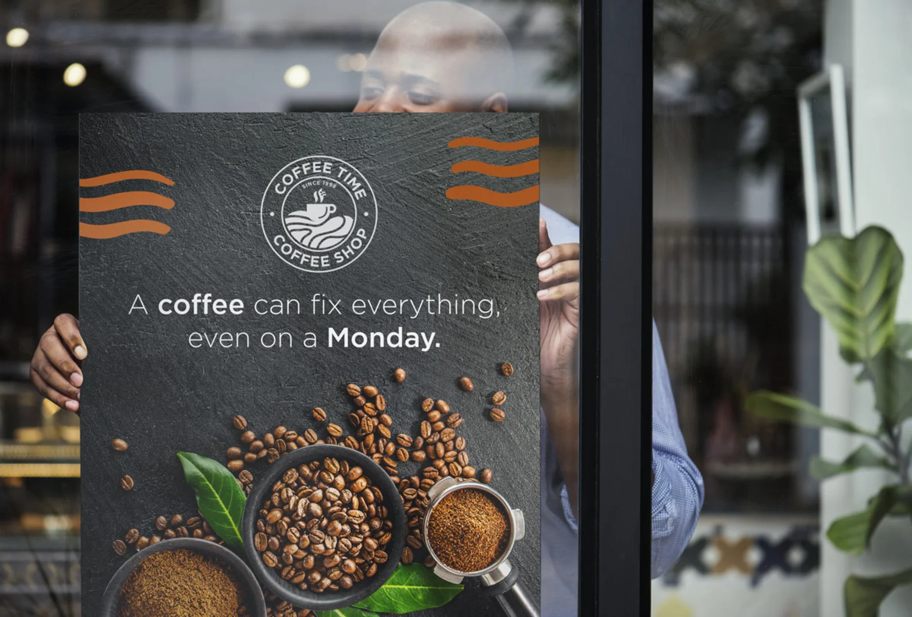 A coffee shop featuring a poster advertising coffee displayed on the window