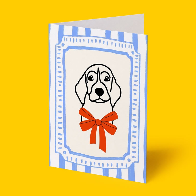 Greeting card with a dog illustration wearing a red bow, on a blue-and-white striped background.