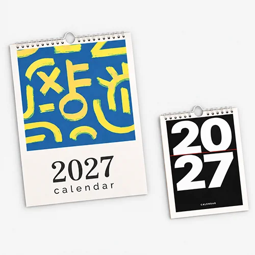 Two 2026 calendars, one with abstract art and one with large white numbers on black.