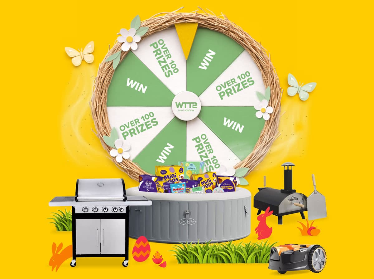 Prize wheel with text "WIN" and "OVER 100 PRIZES," grill, hot tub, oven, and Easter eggs in front.