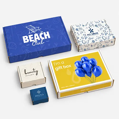 Five cardboard boxes of varying sizes and designs, including branding for Beach Club and Pet House.