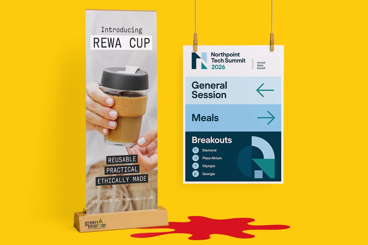 A REWA CUP banner and a Northpoint Tech Summit 2026 sign on a yellow background.