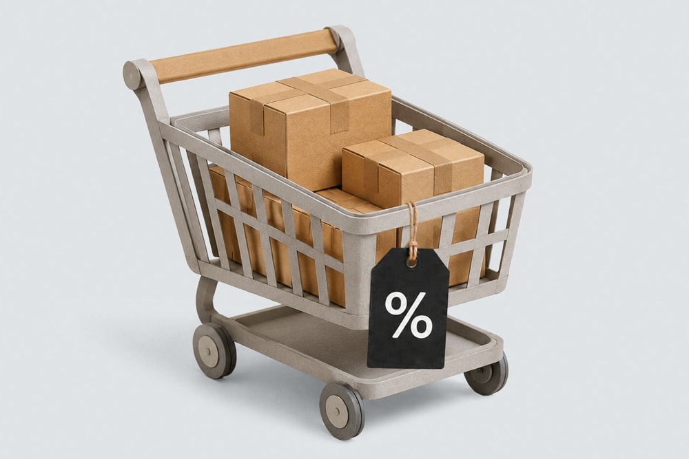 Mini shopping cart with cardboard boxes and a percentage discount tag attached.