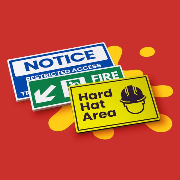 Three safety signs: “Notice”, “Fire Exit”, and “Hard Hat Area” on a red background.