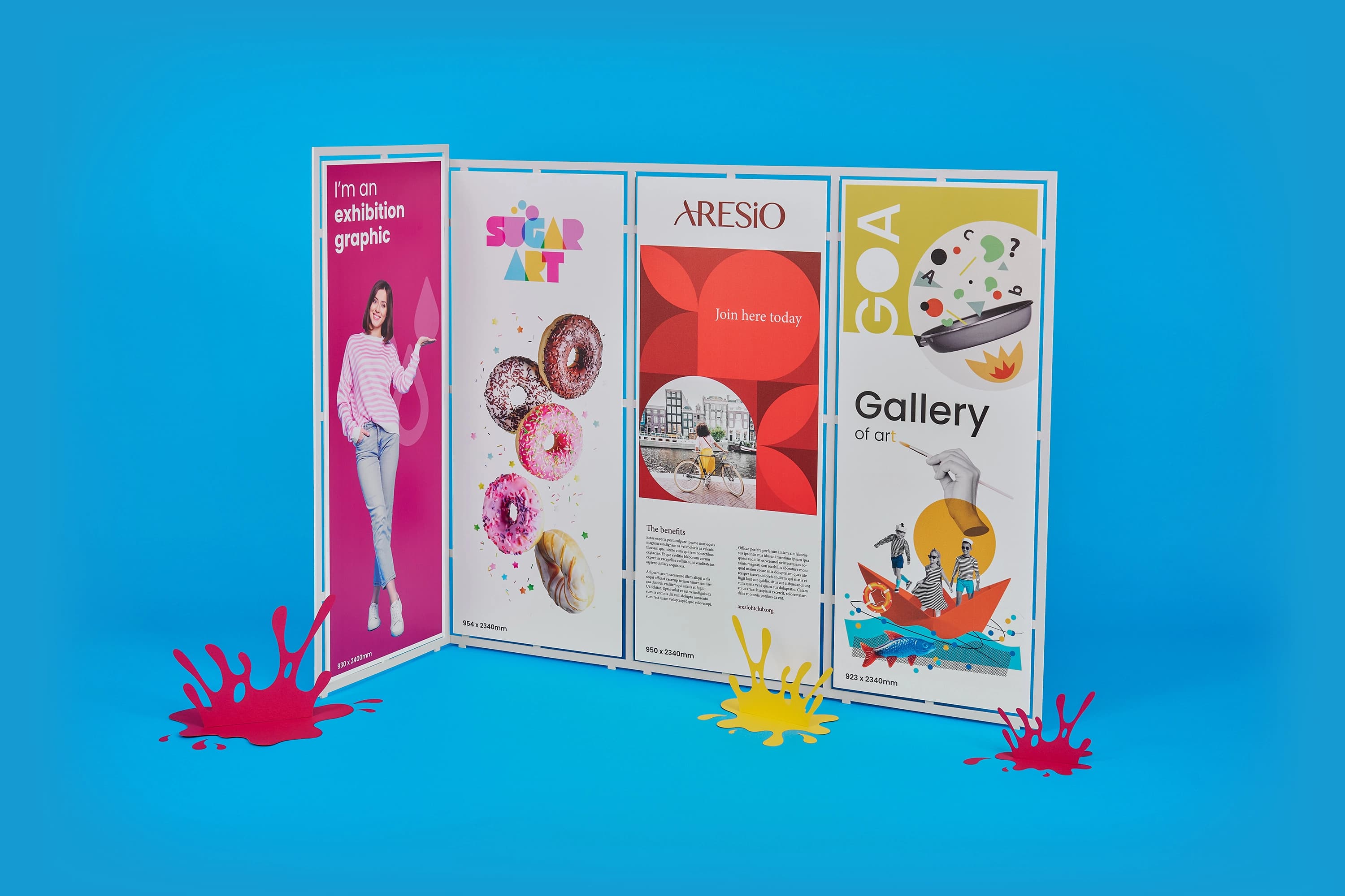 Colorful exhibition panels with art and text against a blue background.