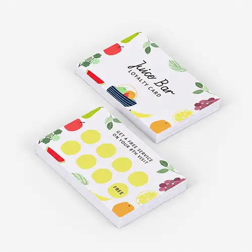 Two stacks of Juice Bar loyalty cards with colourful fruit illustrations on a light background.