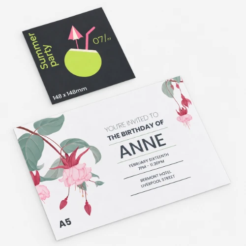 Two printed invitations: a summer party invite and a birthday invitation for Anne on a gray surface.