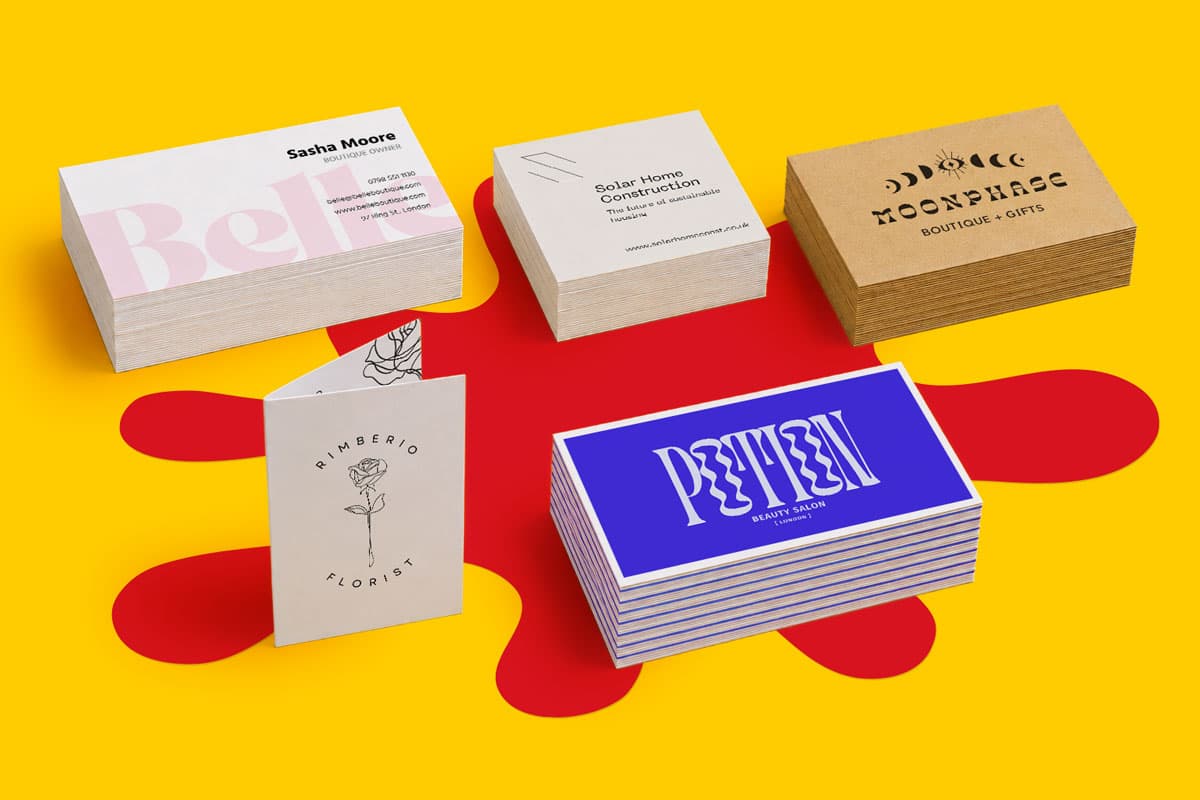 Five stacks of assorted business cards displayed on a yellow and red background.