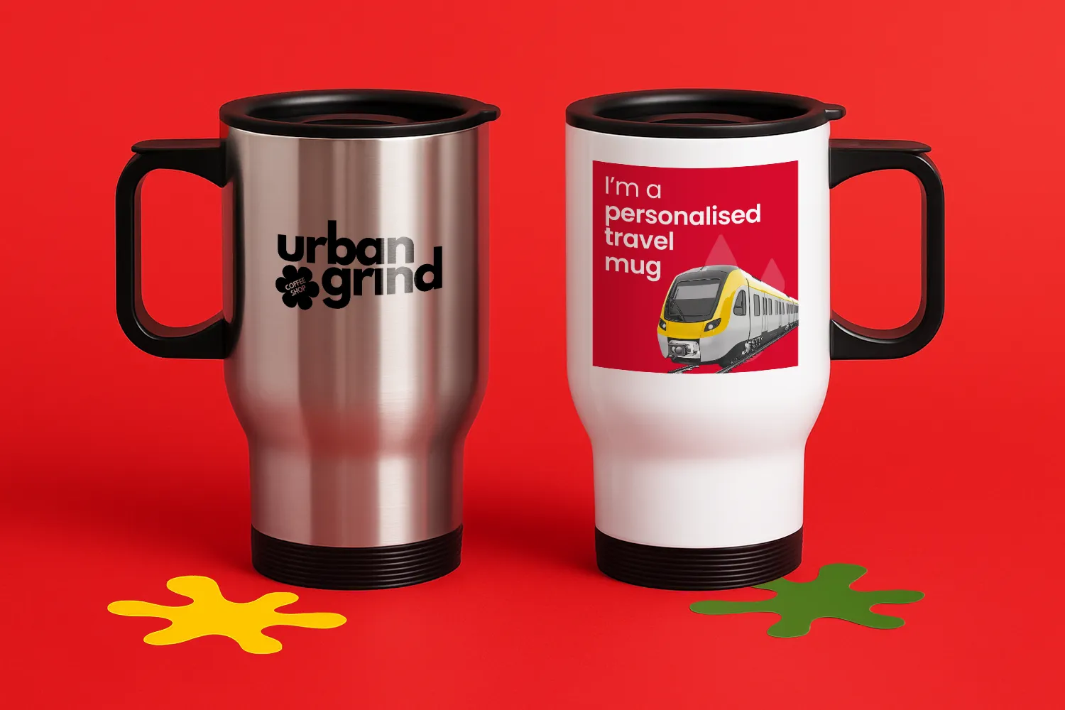 Two travel mugs on a red surface, one silver with "urban grind", one white with a train image.