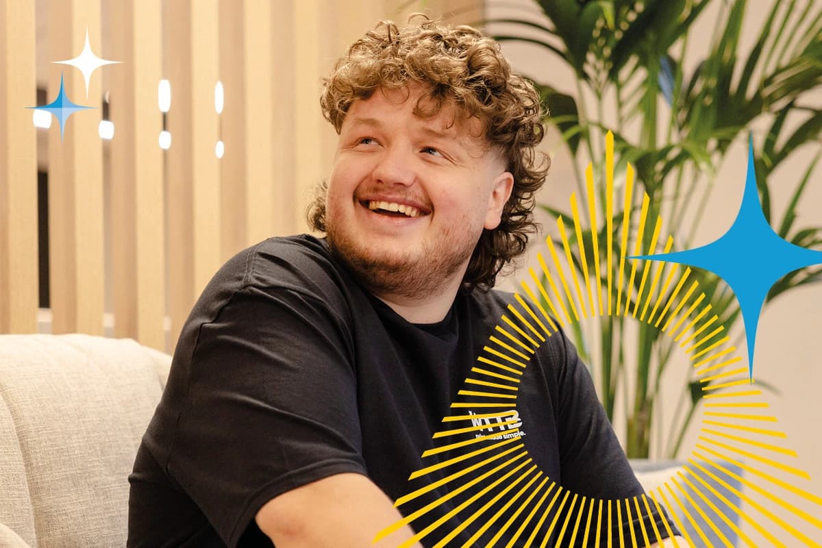 Smiling person with curly hair sitting on a couch, with abstract graphic elements overlaid.