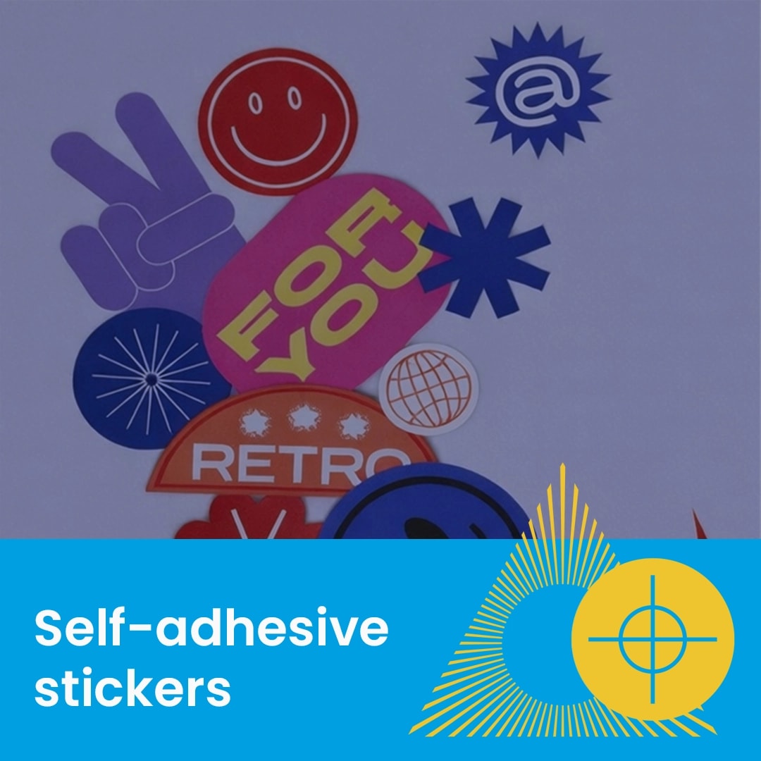 Assorted colorful self-adhesive stickers arranged above a blue label reading "Self-adhesive stickers.