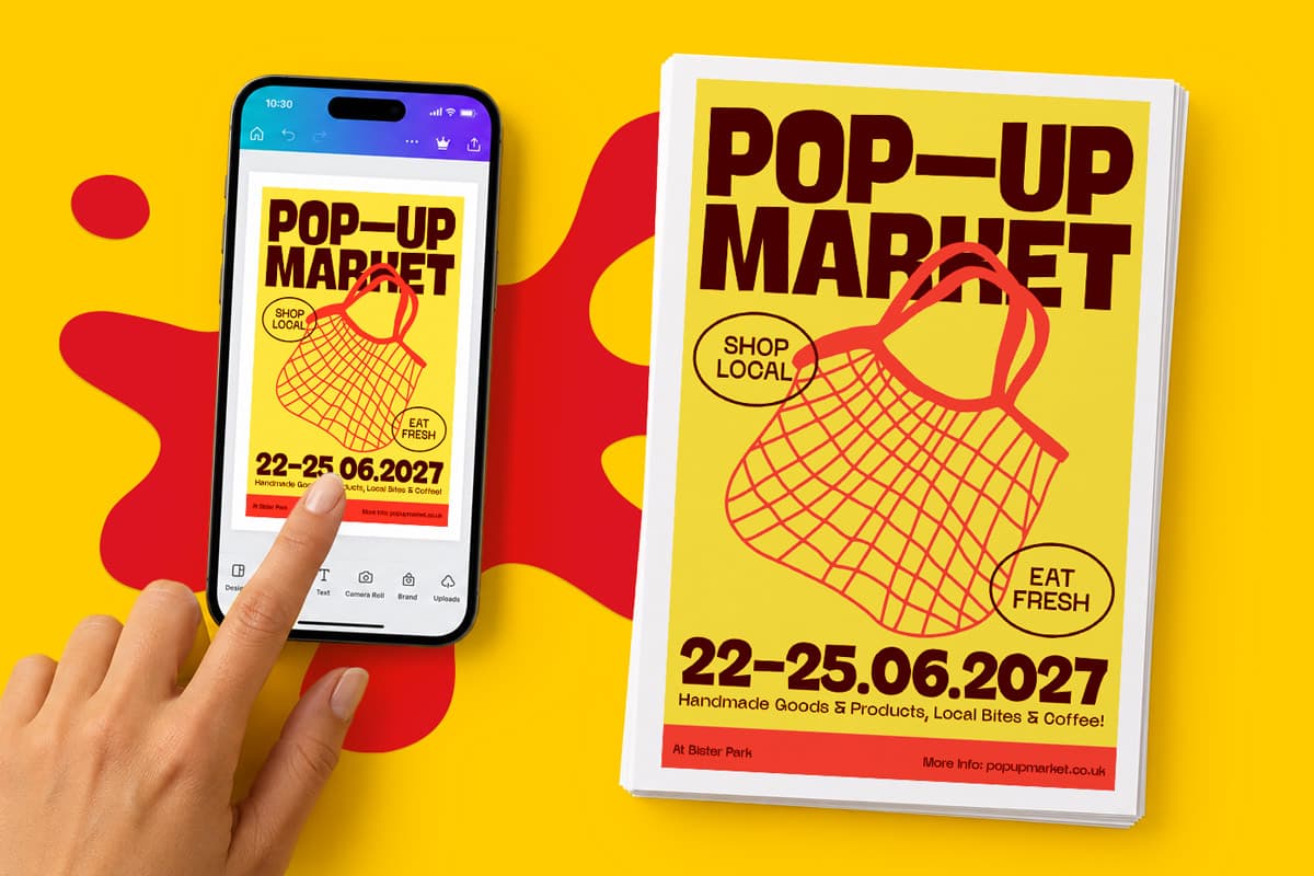 Hand taps phone showing a pop-up market poster; same poster lies beside it on a yellow surface.
