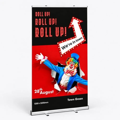 Circus-themed banner with clown, event date 28th August, and "We're in town" message.