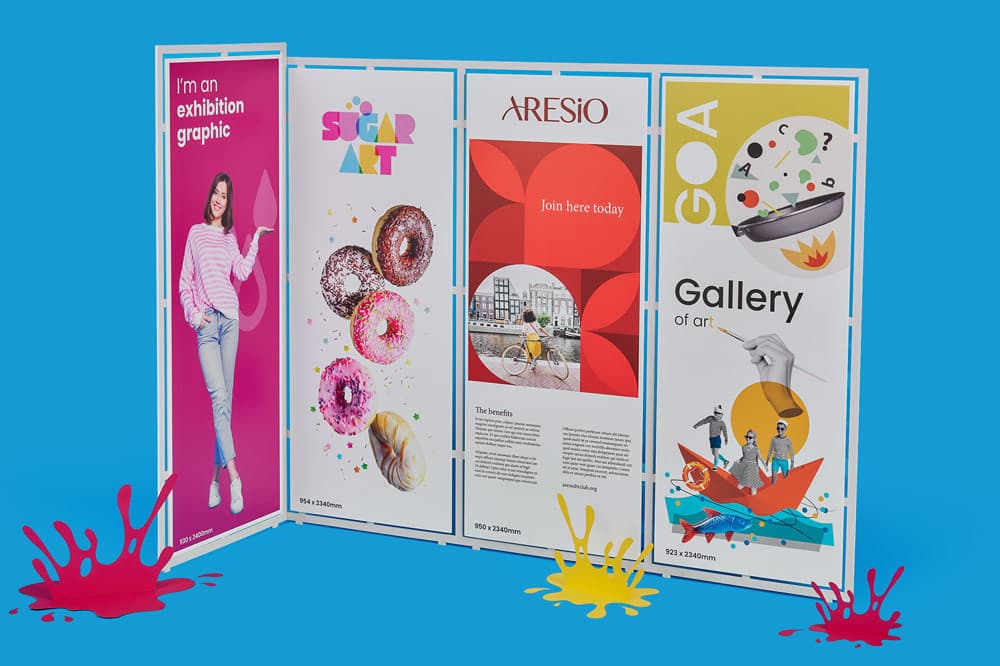 Four connected exhibition display banners with colorful graphic designs.