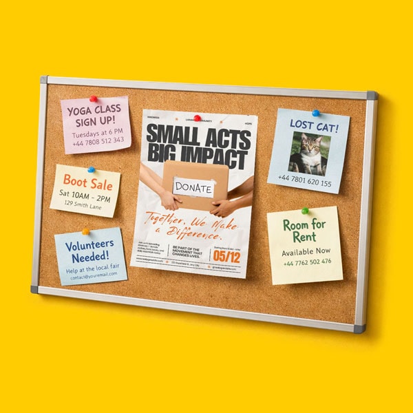 Corkboard with six colorful notes about local events, a lost cat, and a donation drive.