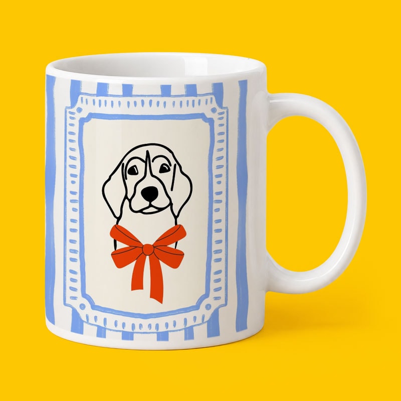 White mug with a beagle illustration wearing a red bow, bordered by blue stripes.