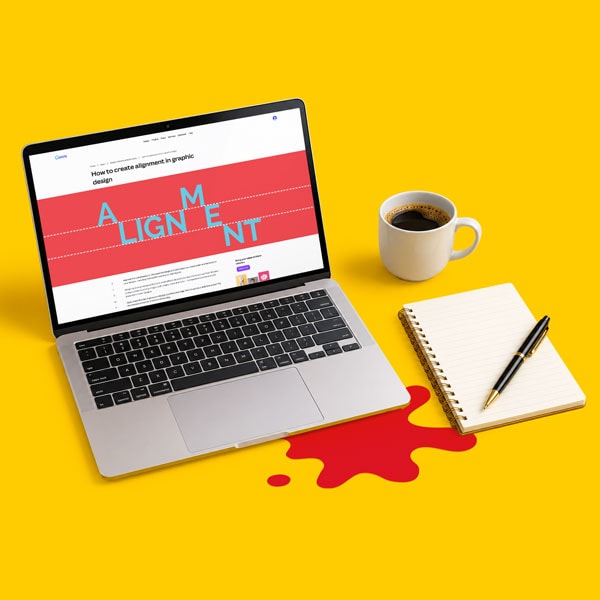 Laptop on yellow desk with a spilled-red-liquid effect, a notebook, and a cup of coffee nearby.