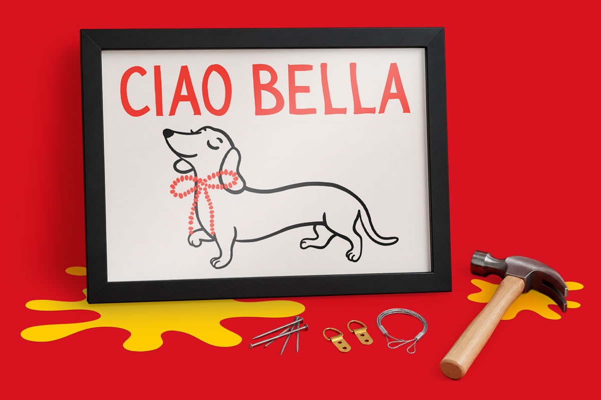 Framed dog illustration with "CIAO BELLA," hanging tools and hardware on a red background.